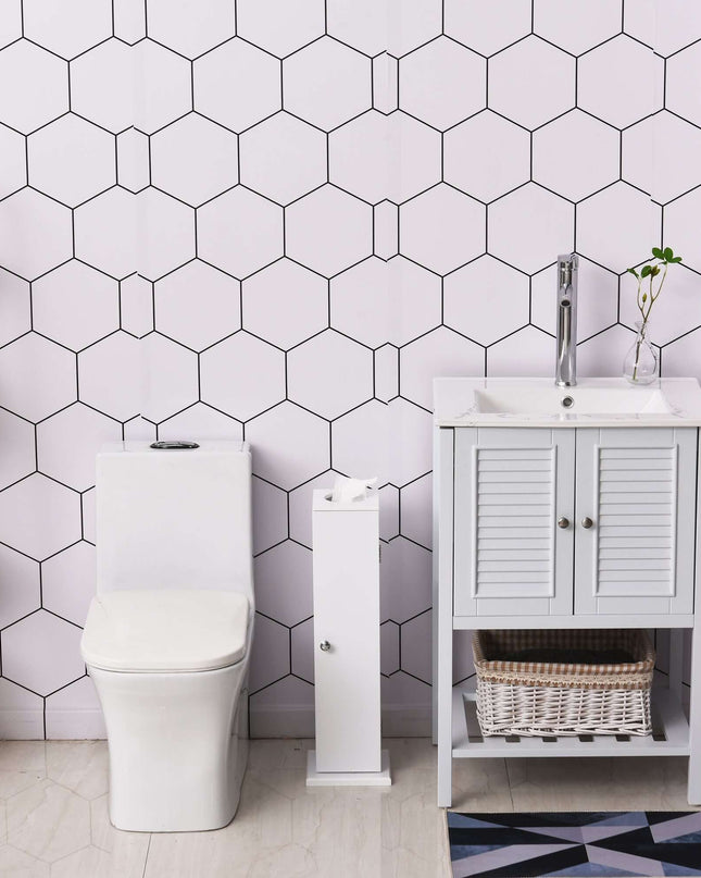 Small Toilet Paper Cabinet in a modern bathroom with hexagon patterned walls and a white toilet.